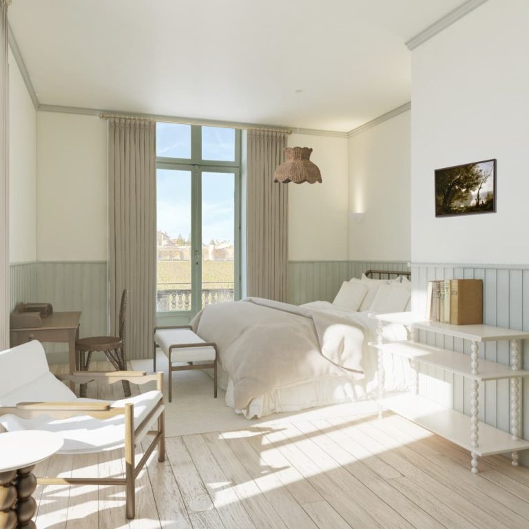 vue de la chambre deluxe terrasse avec coin lit et grande fenêtre